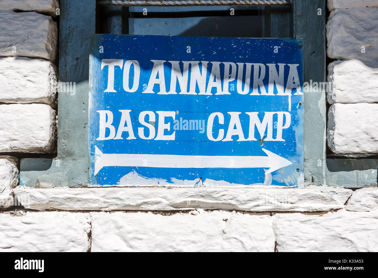 Sign indicating the way (right) for the ABC on the Annapurna Base Camp ...