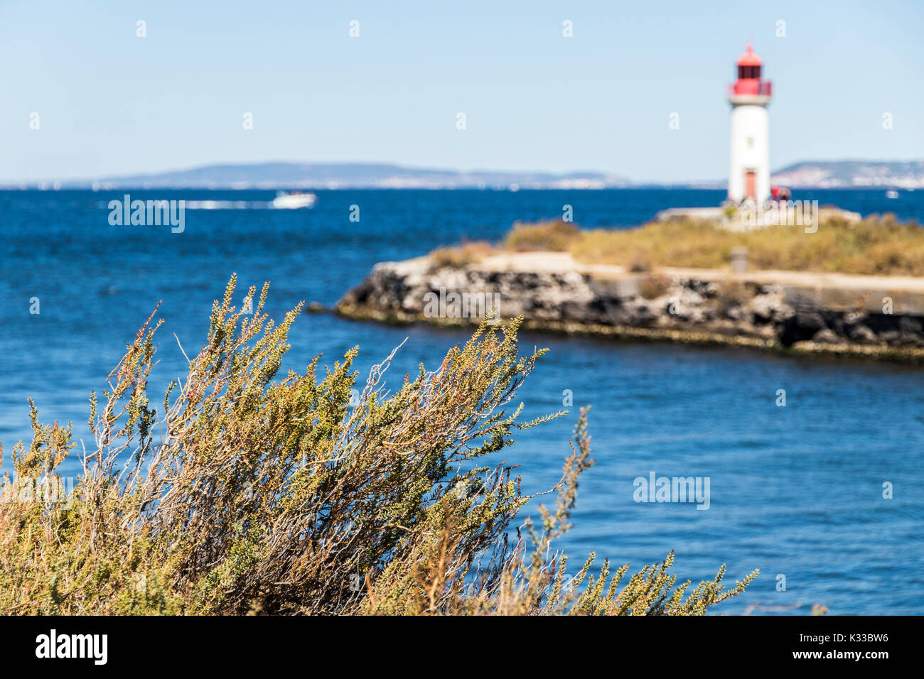 The Les Onglous lighthouse, terminating point of the Canal du Midi where the it enters the Etang de Thau. World Heritage Site. Agde, France Stock Photo