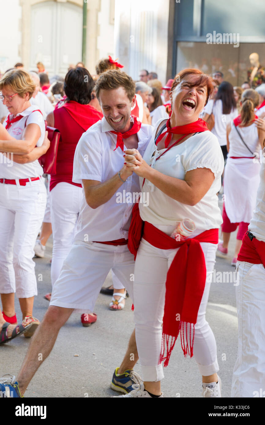 BAYONNE, FRANCE - JULY31: Unknown people dresses in traditional red and  white clothes enjoying the "Fetes de Bayonne" festivals in the Northern  Basque Stock Photo - Alamy