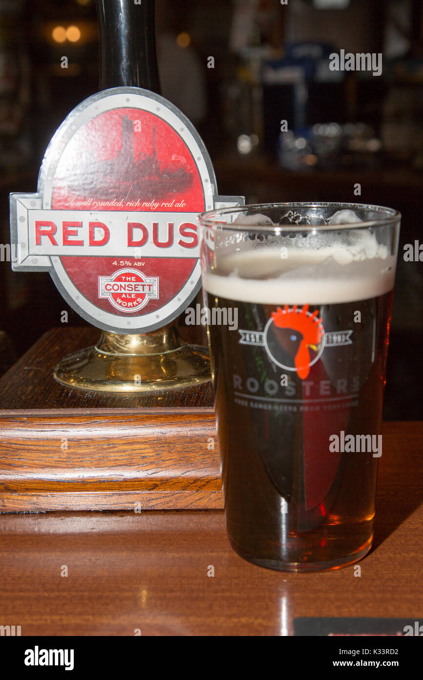 An English pint of Red Dust real ale next to the hand pump, from Conset ...