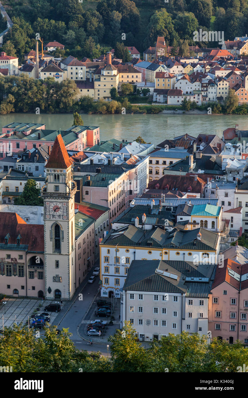Top view of the typical church and houses set among green woods and river Passau Lower Bavaria Germany Europe Stock Photo