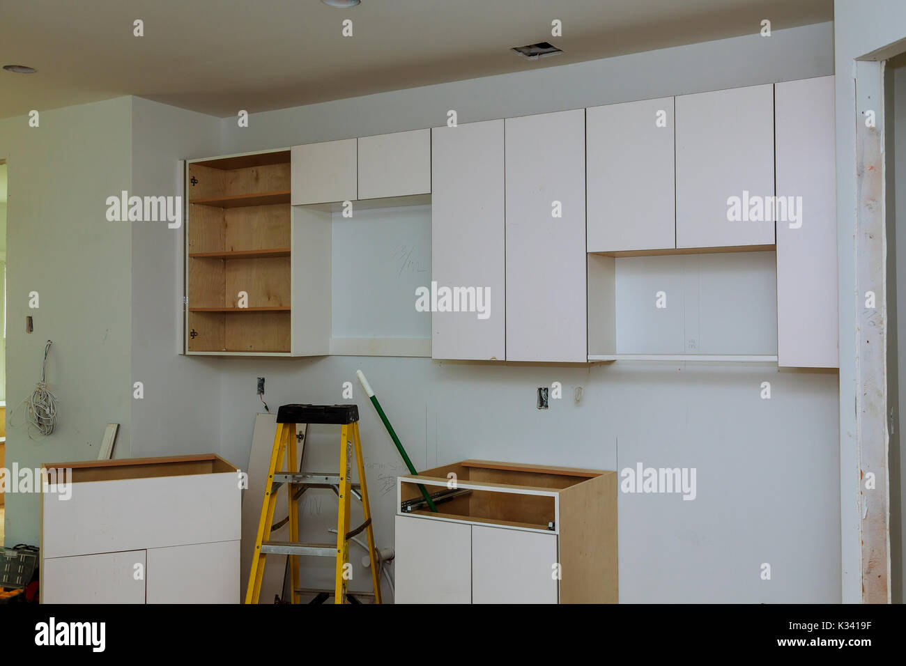 Installation of kitchen. Custom kitchen in various stages of installation base for