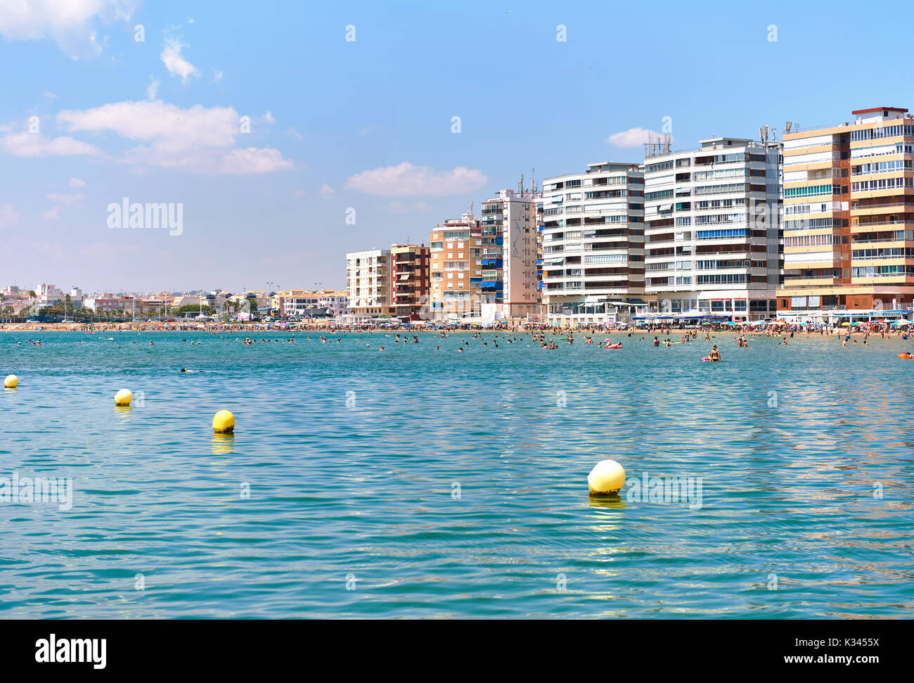 View to the high rise buildings and beach of Torrevieja at summertime. Costa Blanca. Spain Stock Photo