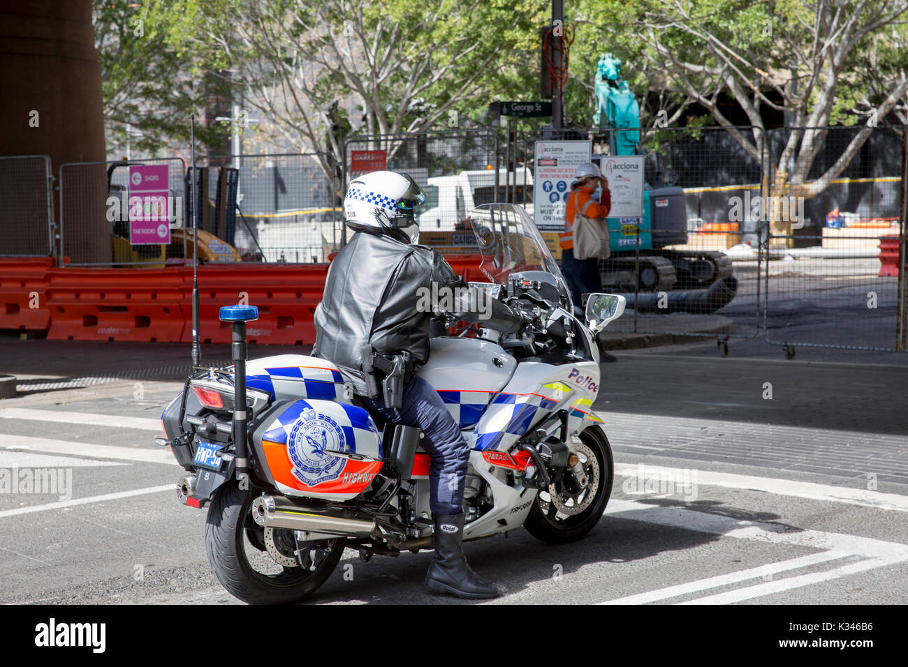 New South Wales police officers riding through Sydney city centre on police motorcycles,Sydney,Australia Stock Photo