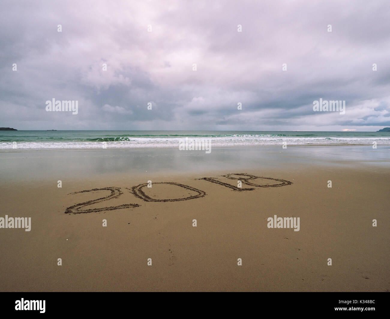 words 2018 on the sandy beach,Northern Ireland Stock Photo