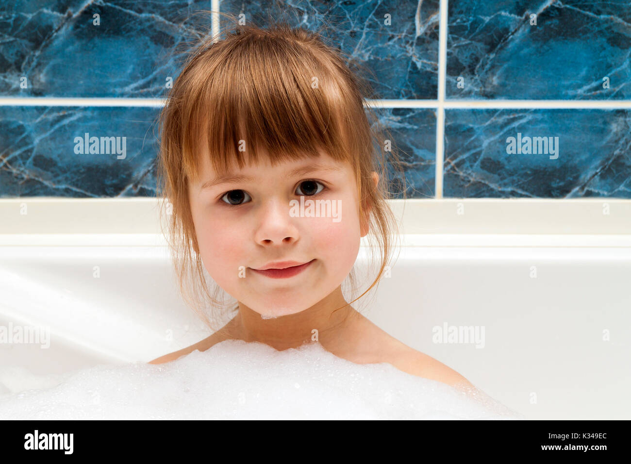 Portrait of pretty little girl in bath. Hygiene concept Stock Photo - Alamy