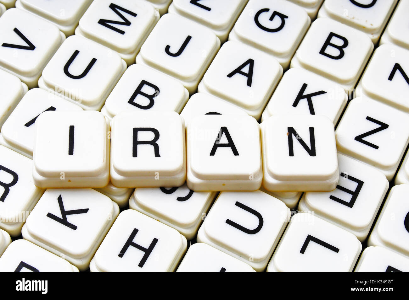 Iran text word crossword. Alphabet letter blocks game texture