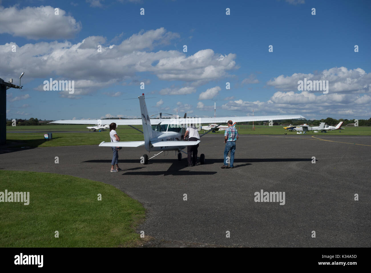 Light Aircraft being checked over. Wolverhampton Halfpenny Green Airport. South Staffordshire. UK Stock Photo