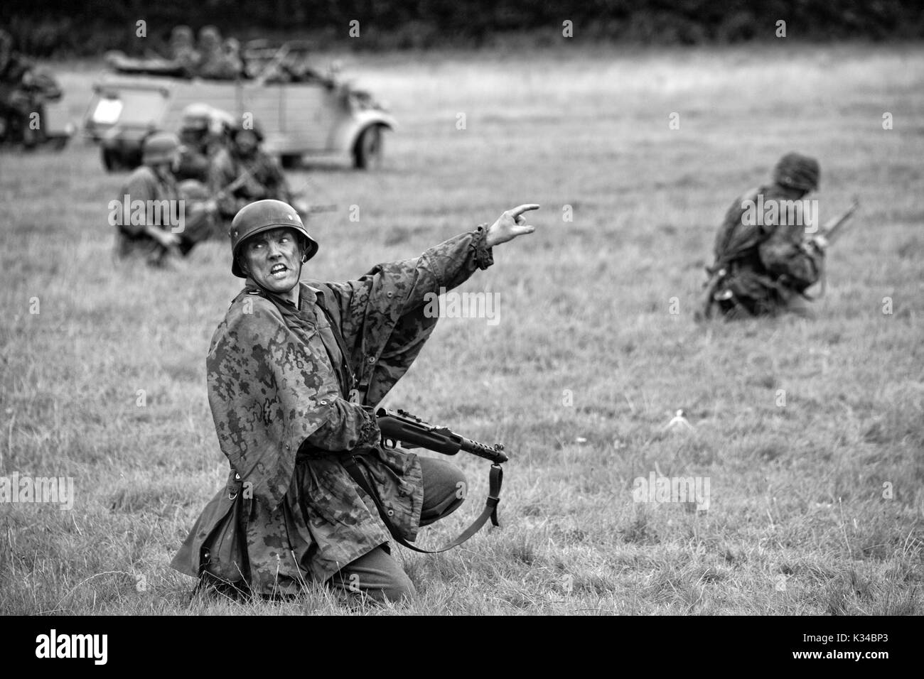 KENT, UK - AUGUST 25TH 2012: Actors posing as German soldiers from the 2nd World War, at the Military Odyssey Re-enactment event in Detling, Kent, on  Stock Photo