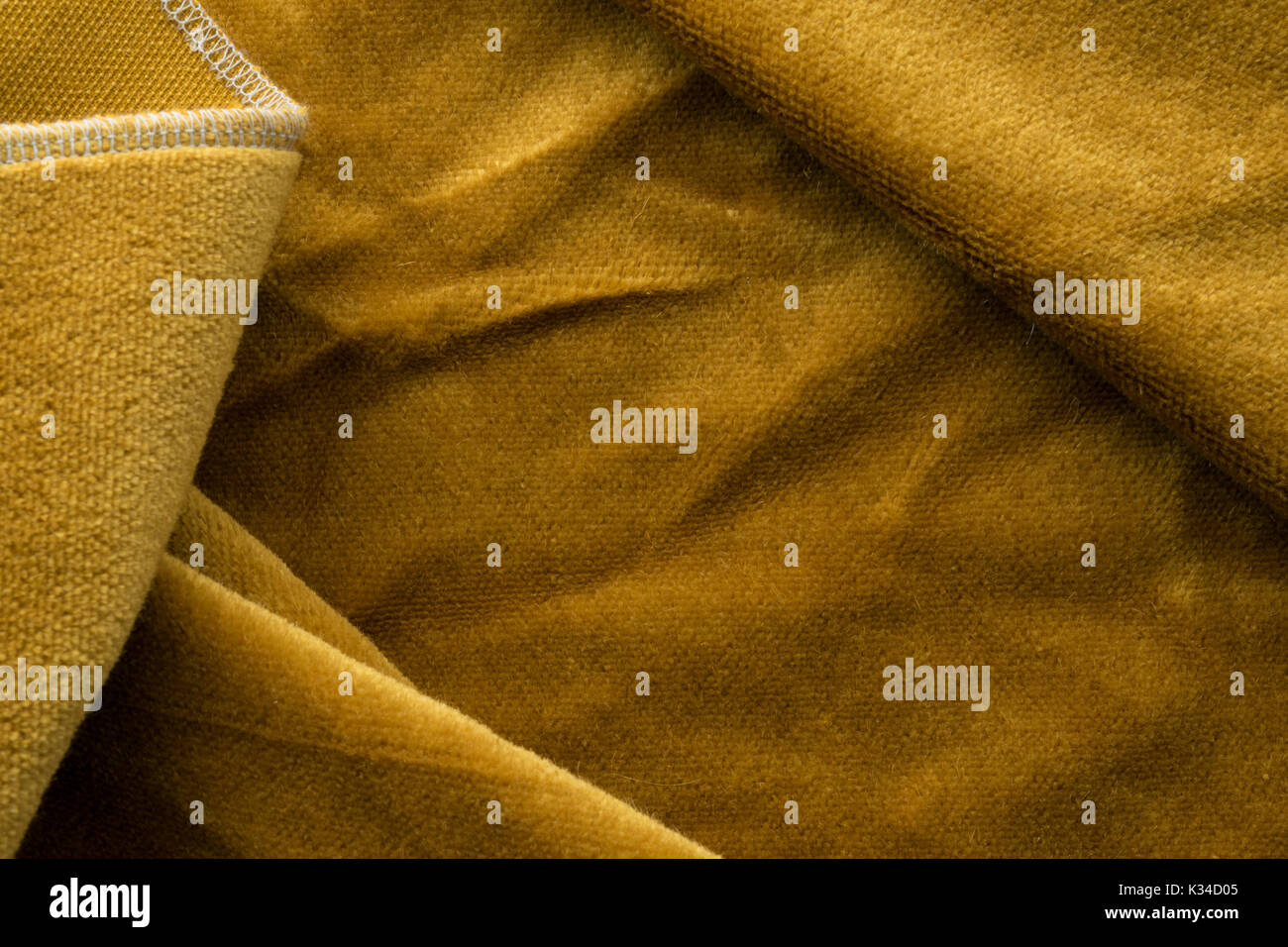 Expensive golden angora goat velour fabric mixed with silk fibers