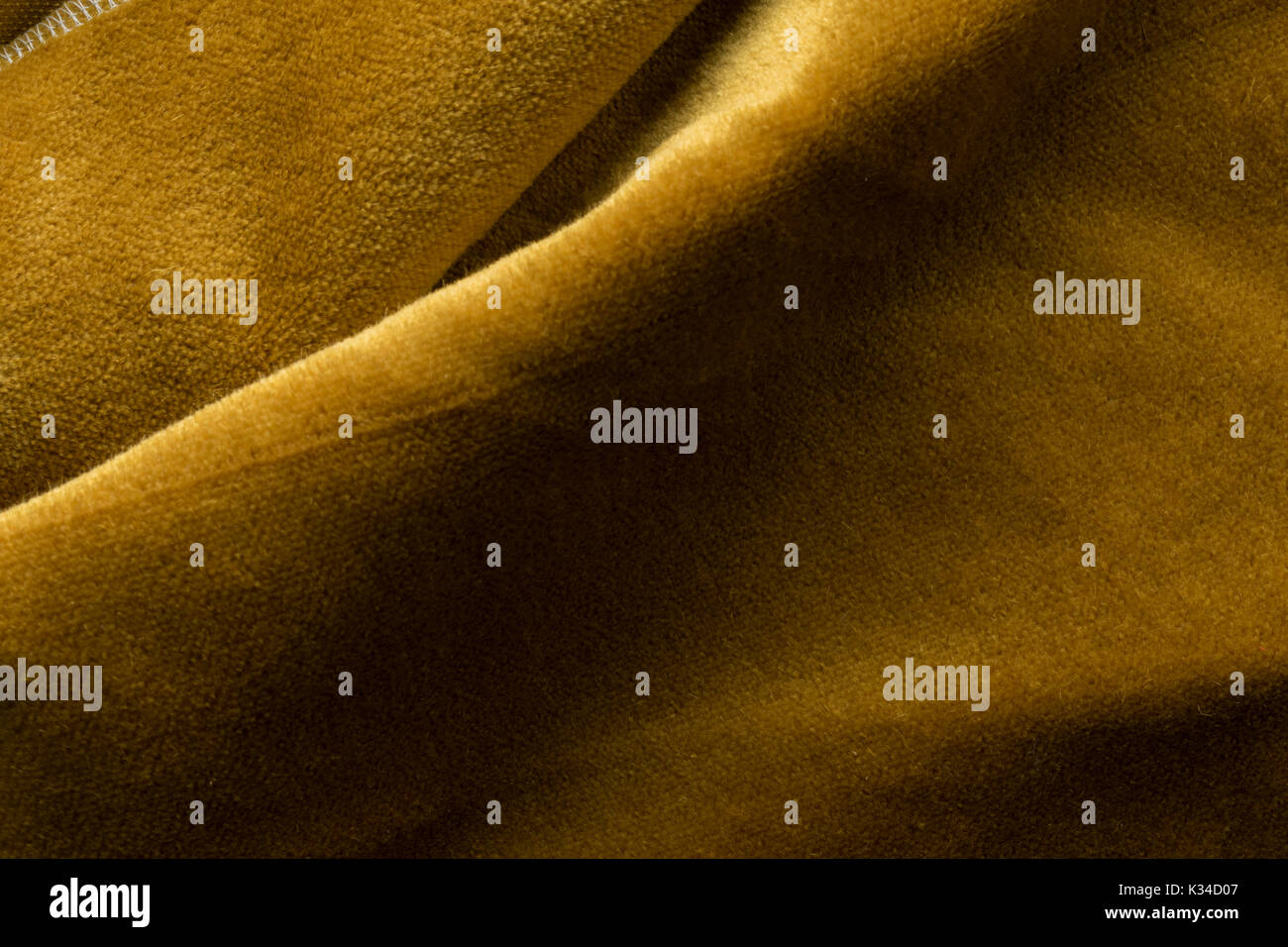 Expensive golden angora goat velour fabric mixed with silk fibers