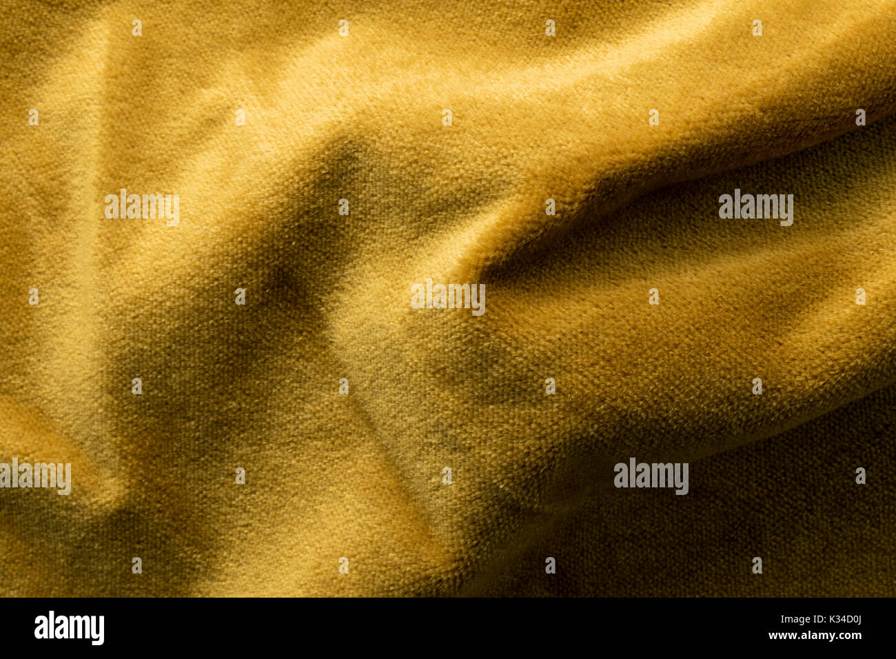 Expensive golden angora goat velour fabric mixed with silk fibers