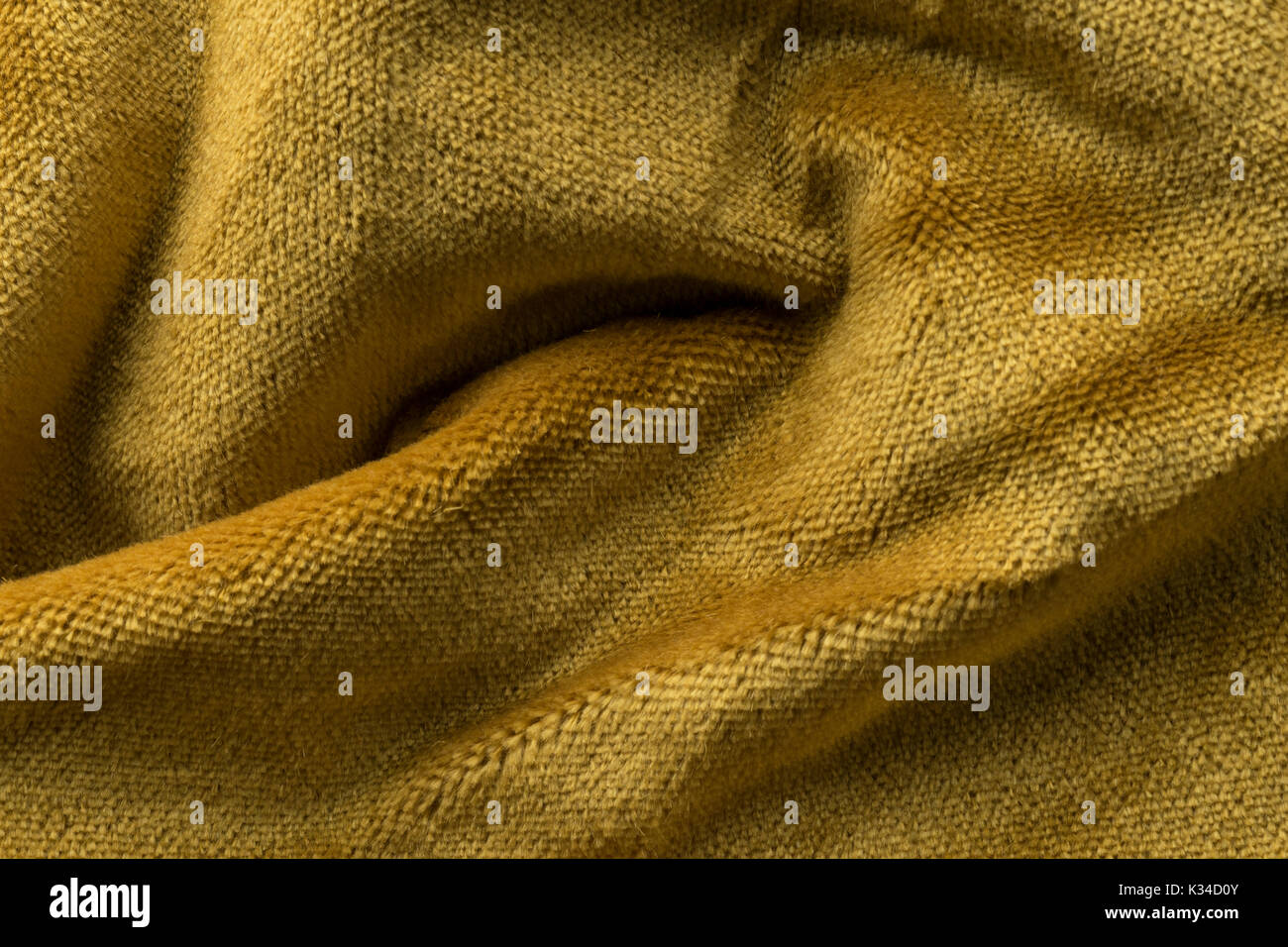 Expensive golden angora goat velour fabric mixed with silk fibers