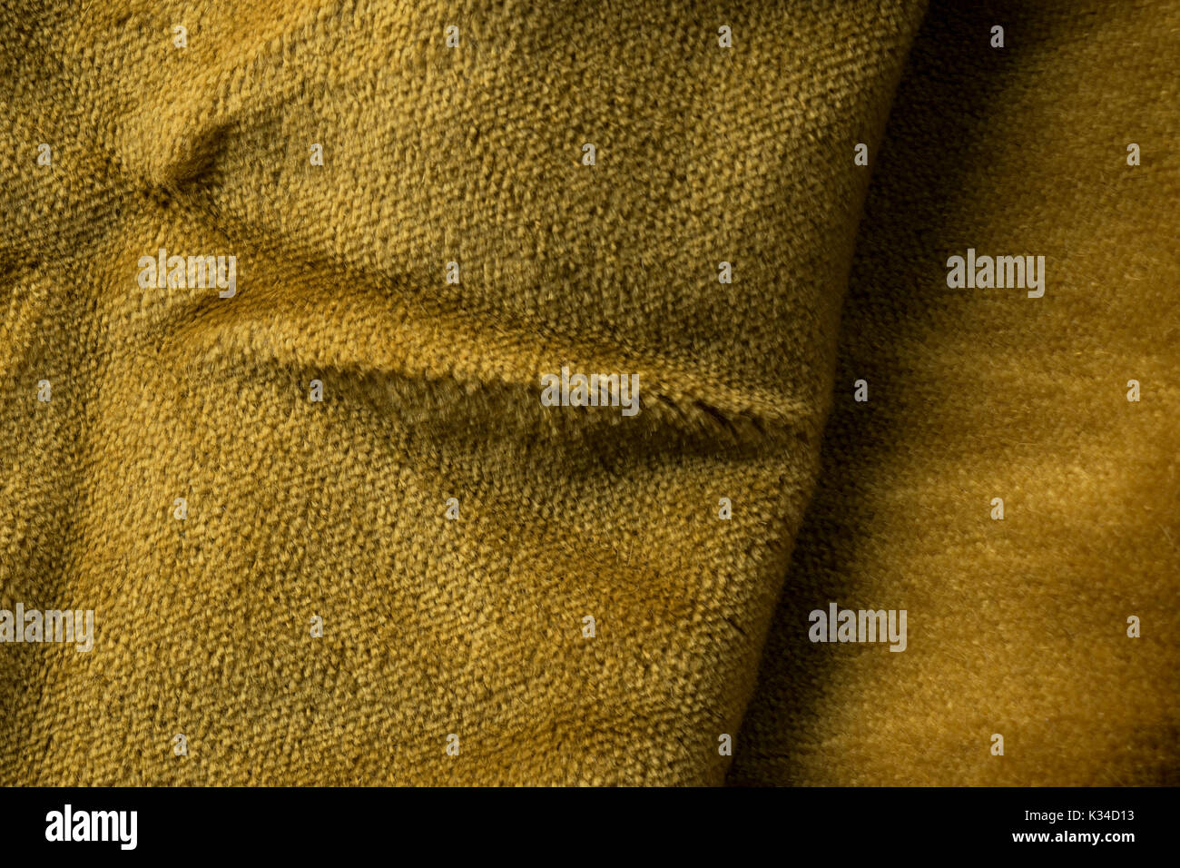 Expensive golden angora goat velour fabric mixed with silk fibers