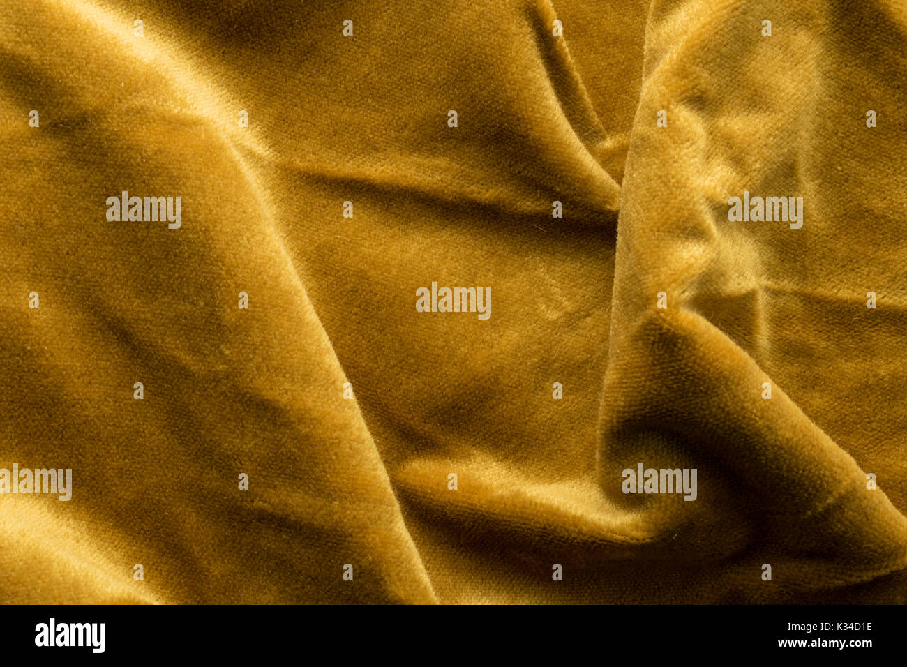 Expensive golden angora goat velour fabric mixed with silk fibers