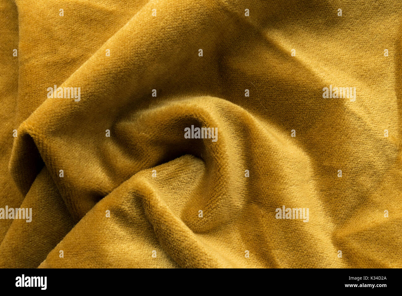 Expensive golden angora goat velour fabric mixed with silk fibers
