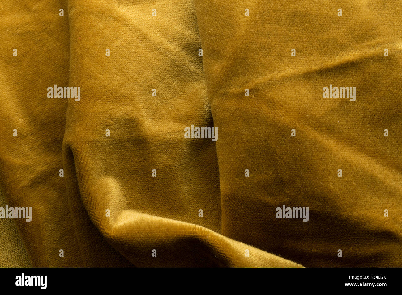 Expensive golden angora goat velour fabric mixed with silk fibers