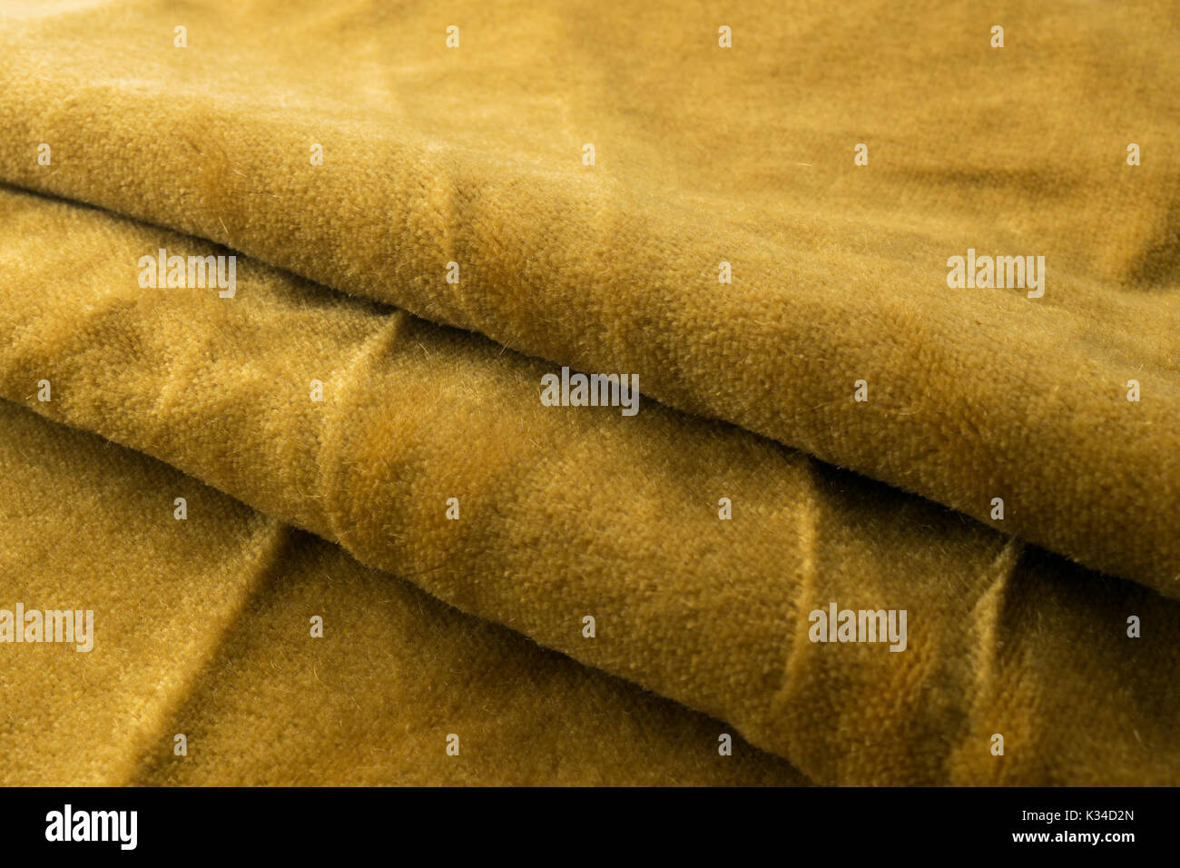 Expensive golden angora goat velour fabric mixed with silk fibers