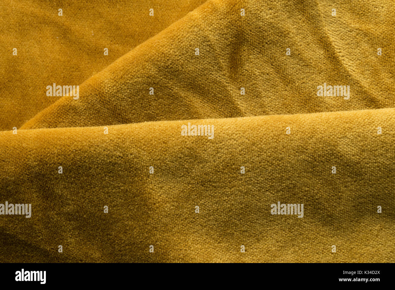 Expensive golden angora goat velour fabric mixed with silk fibers