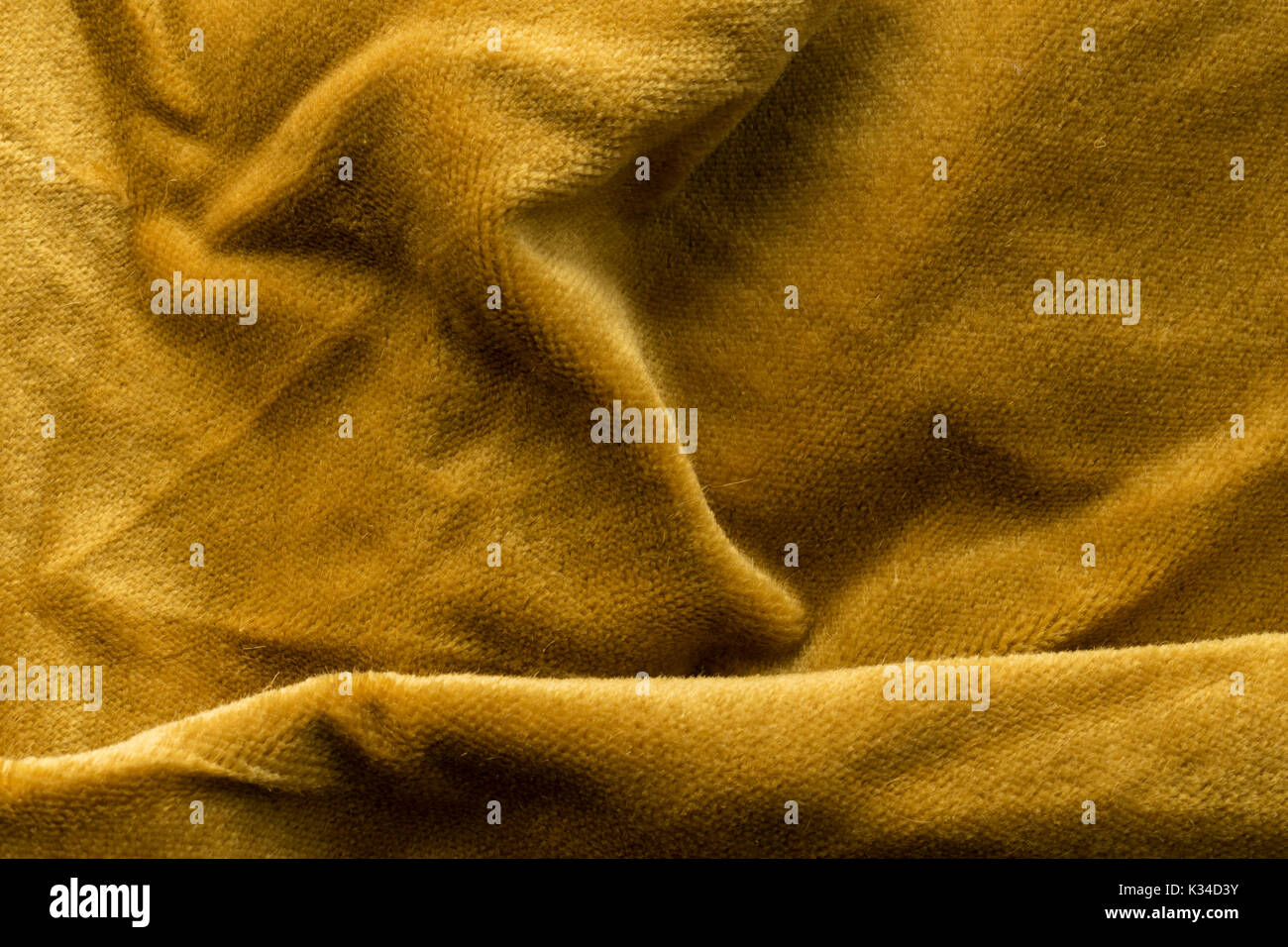 Expensive golden angora goat velour fabric mixed with silk fibers