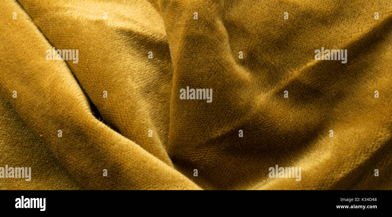 Expensive golden angora goat velour fabric mixed with silk fibers