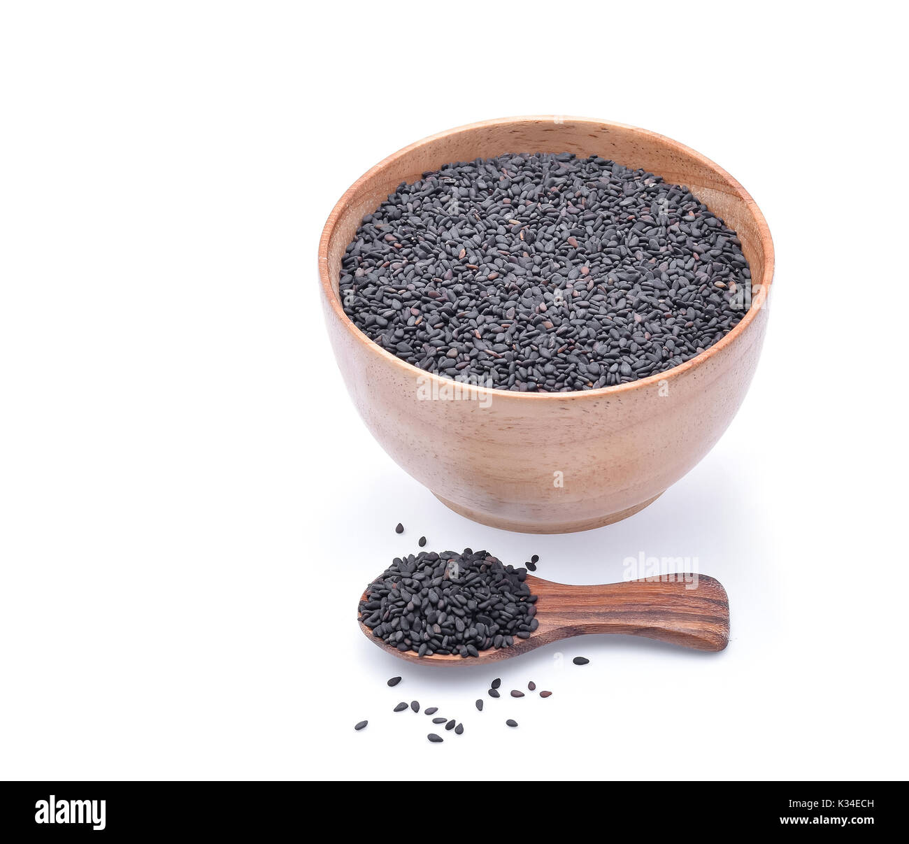 black sesame seeds in wooden bowl isolated on white background Stock ...