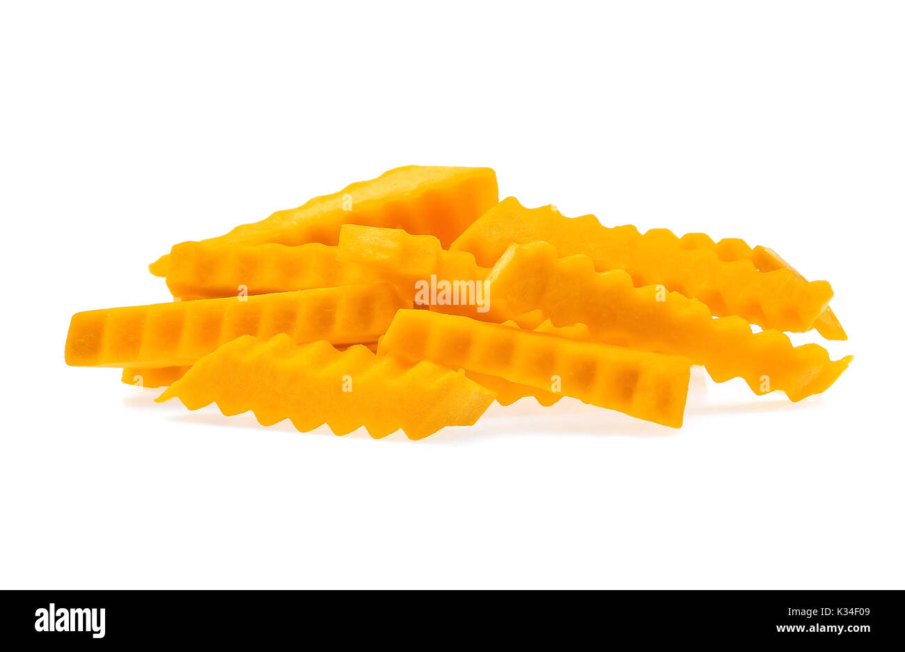 Pumpkin slices on white background. Stock Photo