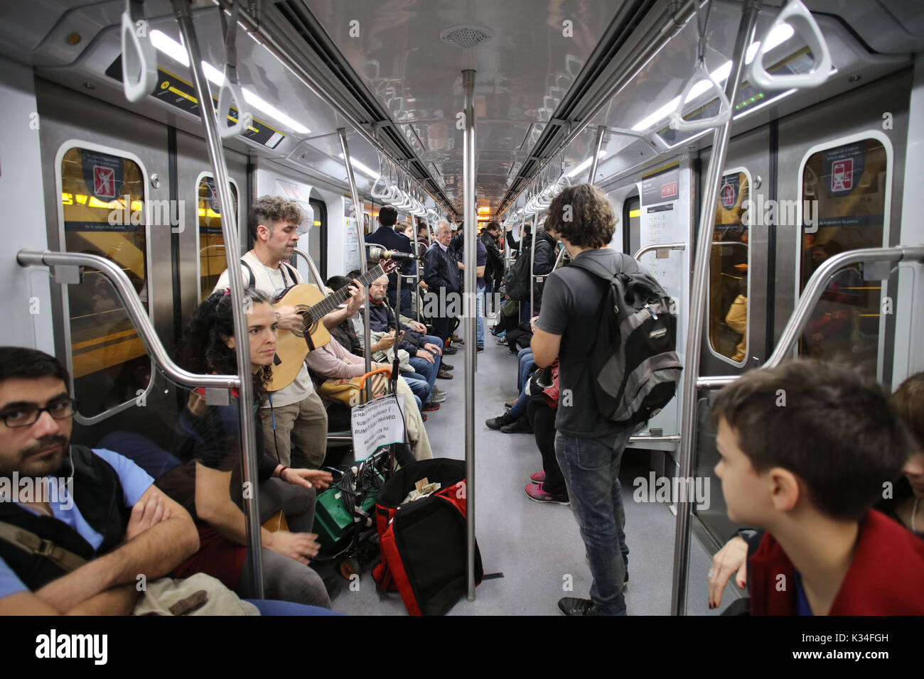 LINE D, BUENOS AIRES, ARGENTINA - SEPTEMBER 2017 - A band called â€˜â€™Rumbo Subterraneoâ€™â€™ plays in the subway train for money. Unidentified peopl Stock Photo