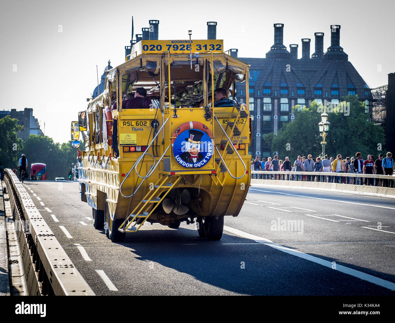 London DUKW Duck tourist transport, an amphibious bus that takes Tourists on a trip around London roads and on the RiverThames. Stock Photo