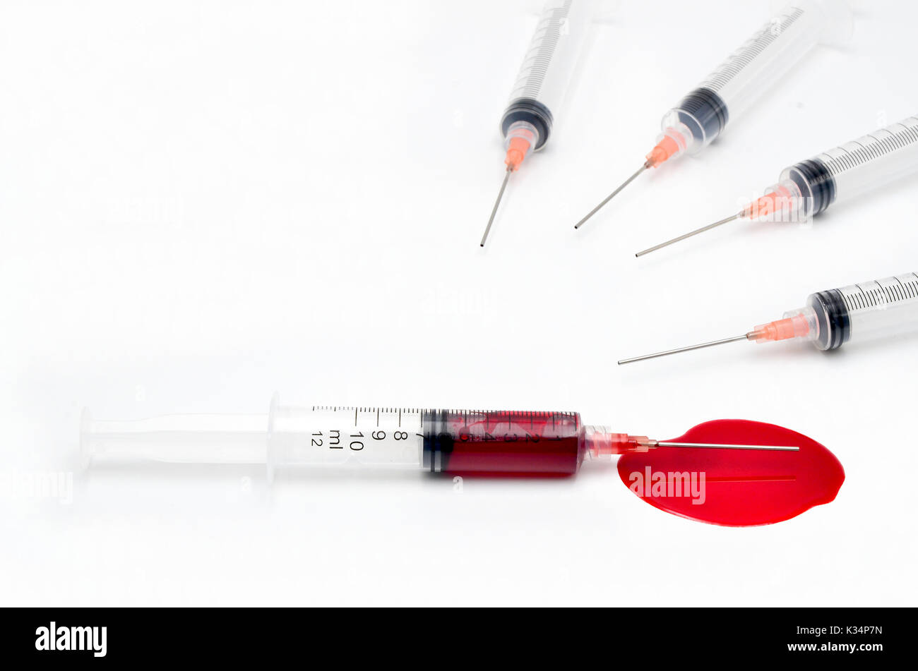 Syringe with blood Stock Photo Alamy