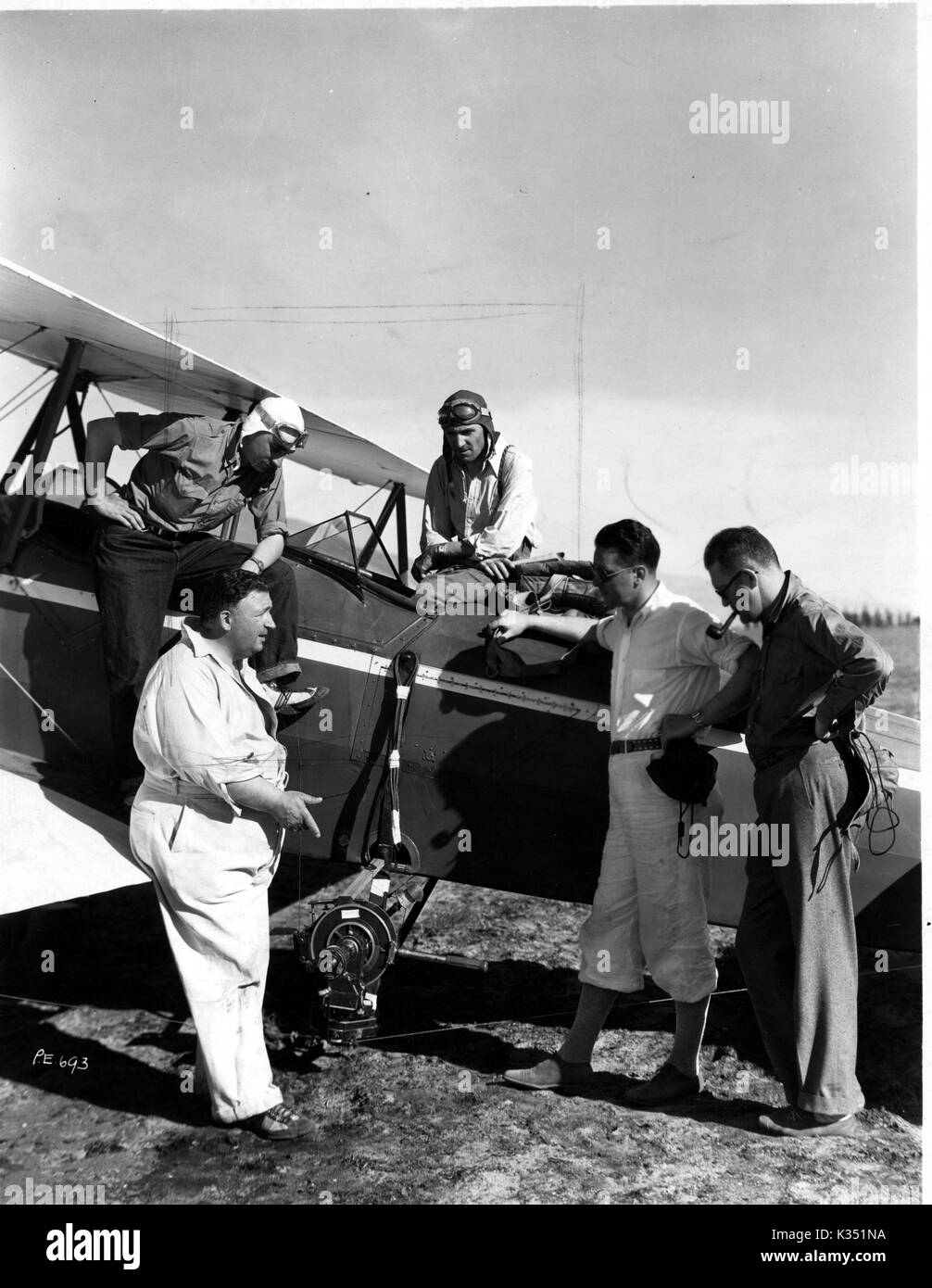 AIRMAIL L-R, director JOHN FORD, stunt pilots JIMMY JAMES, PAUL NANSE, ELMER DYER cameraman, KARL FREUN Stock Photo