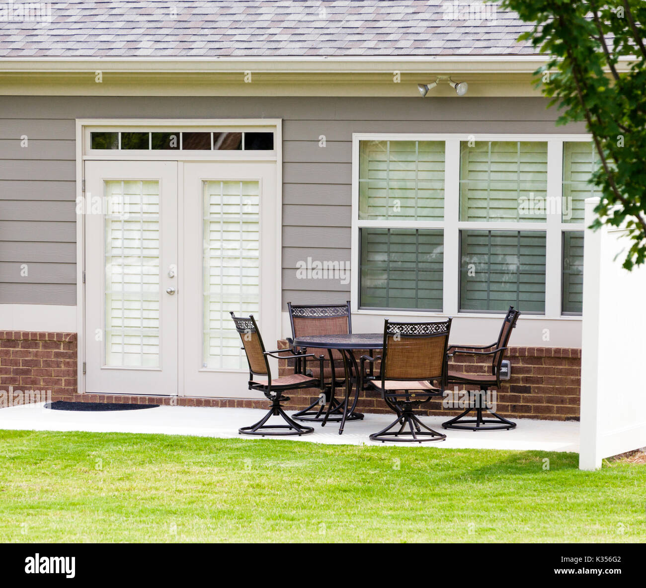 Nice Furniture on Concrete Patio Stock Photo Alamy
