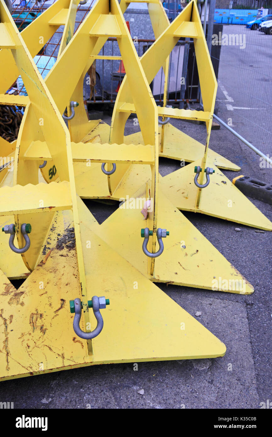 Anchors used to secure marina walkways Stock Photo