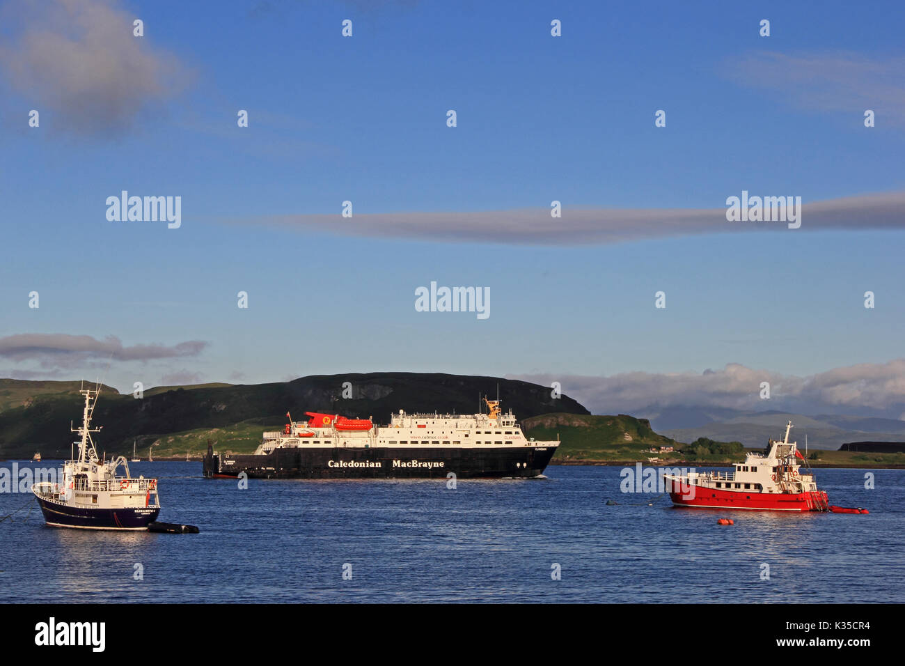 Caledonian McBrayne ferry Clansman leaving Oban Bay, early on a summer morning. Stock Photo