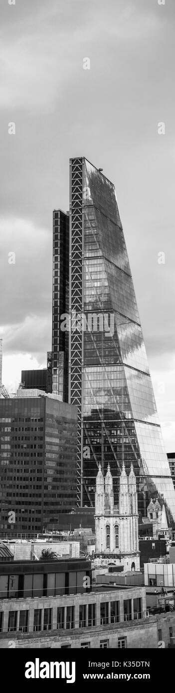 Cheesegrater, 122 Leadenhall Street, and church of St Andrew Undershaft, new contrasting with old in the City of London financial district EC3 Stock Photo