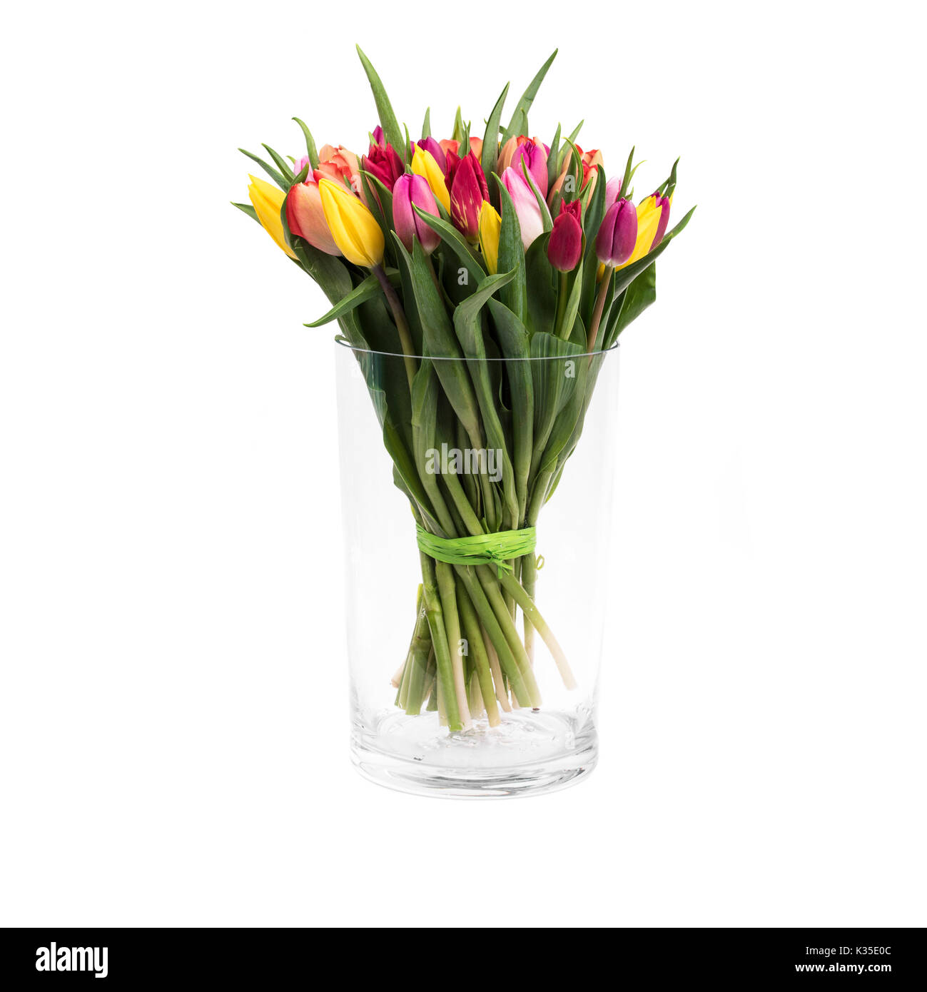 Glass Vase With Big Beautiful Bouquet Of Colorful Tulips Stock