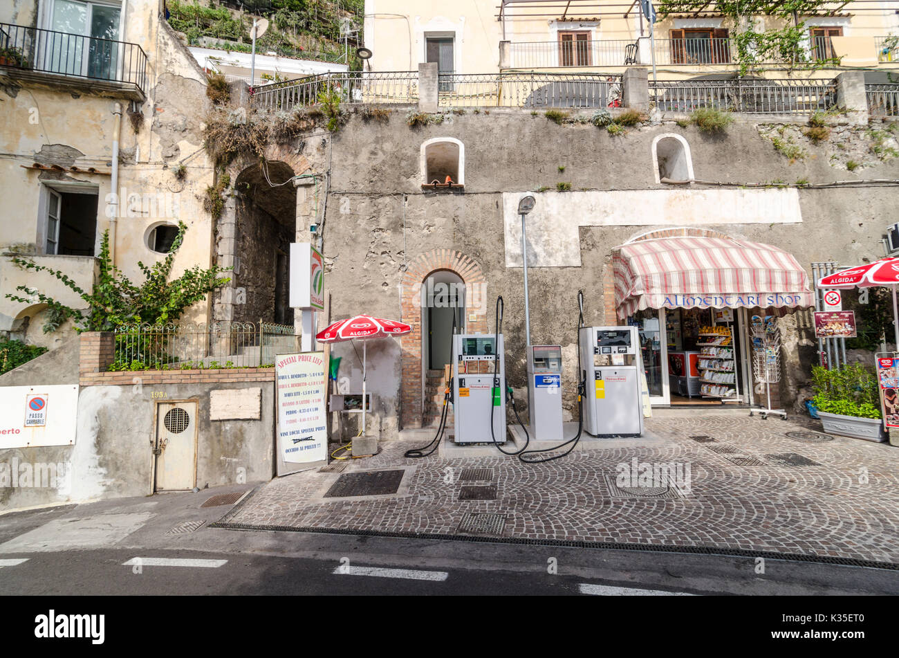Small local shop in Positano, Italy selling petrol fuel. Stock Photo