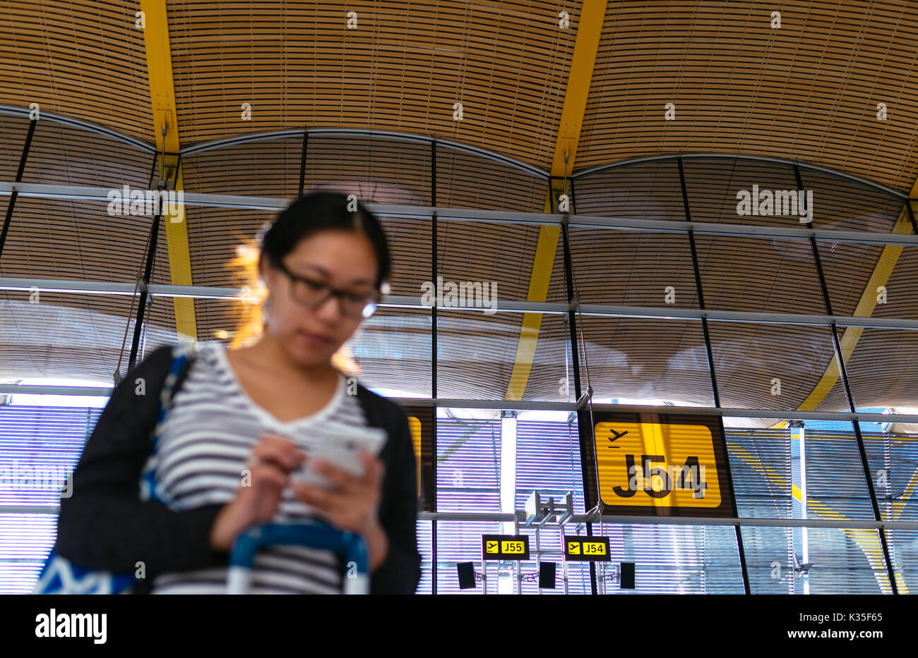 Airport boarding gate woman hi-res stock photography and images - Alamy