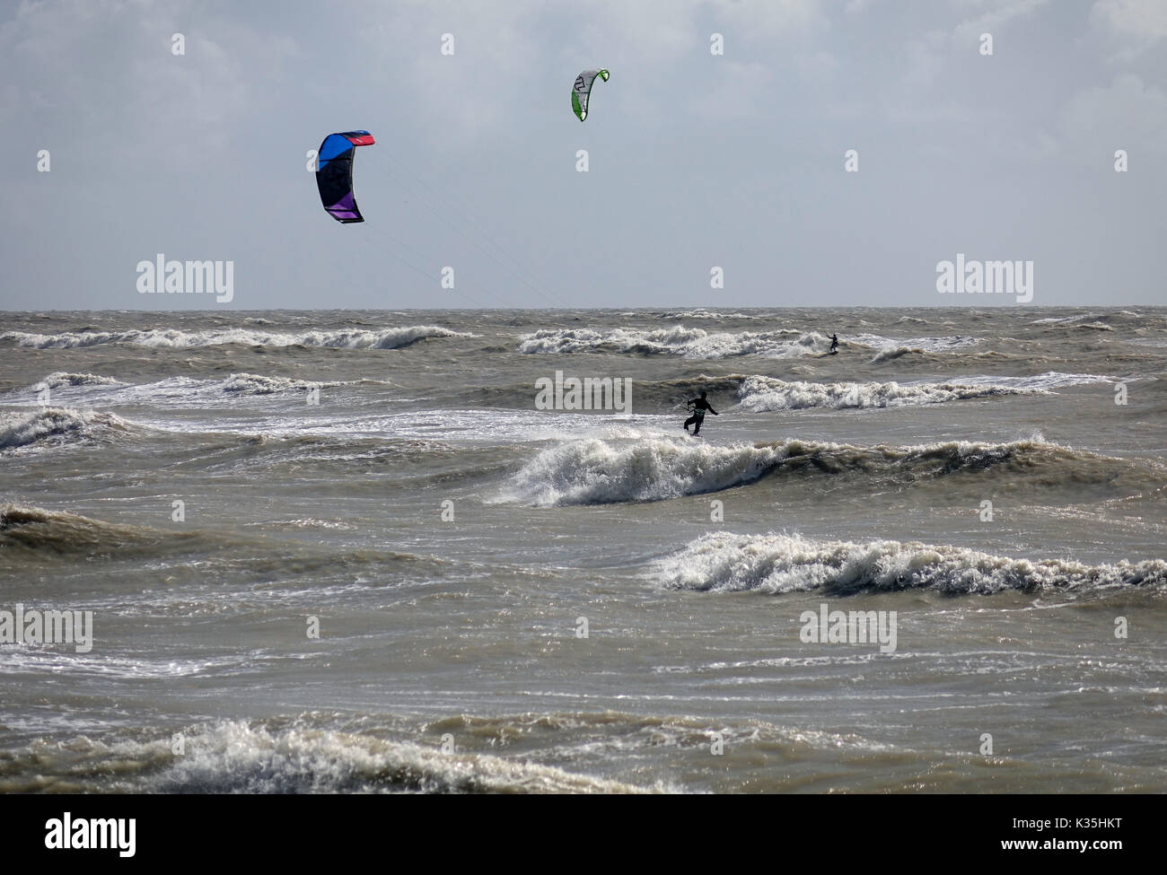 Big wave surfers hi-res stock photography and images - Alamy