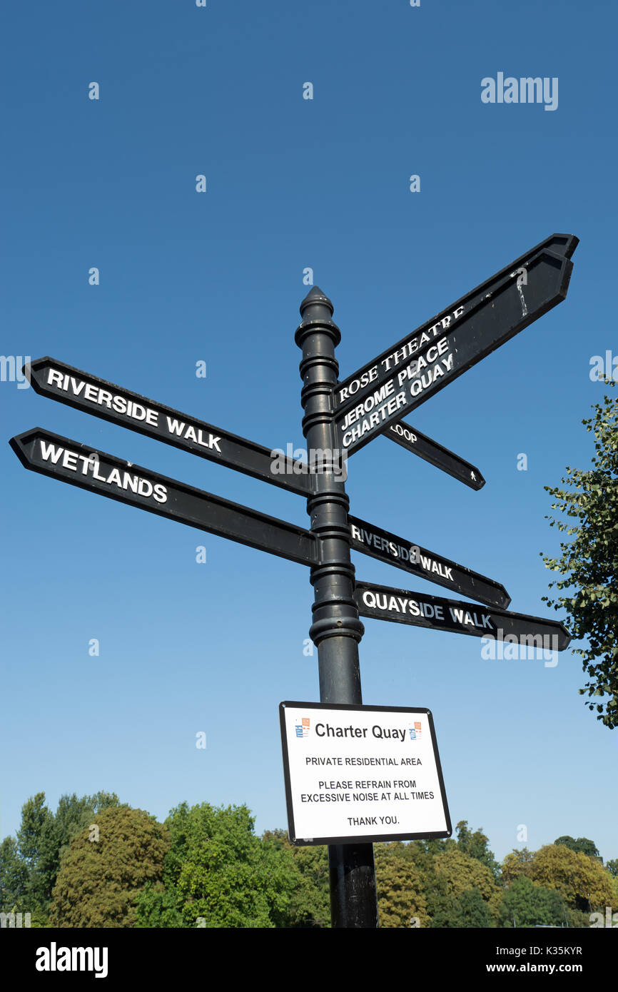 signpost at charter quay, kingston upon thames, surrey, england, giving