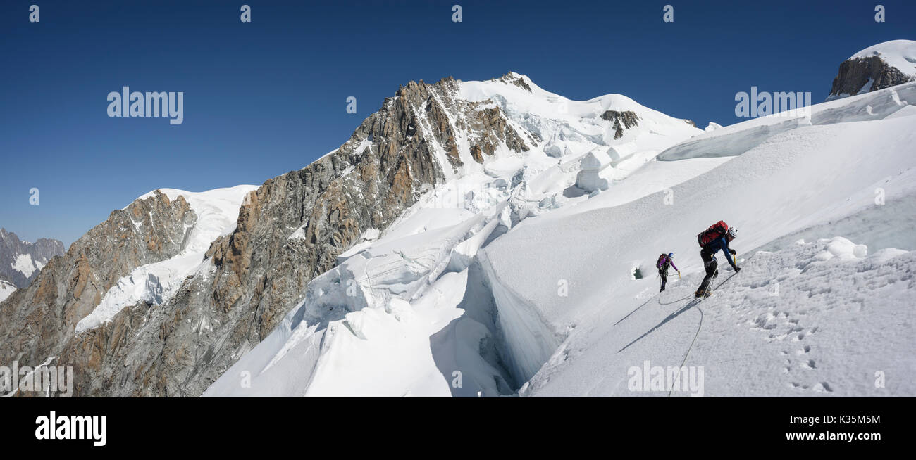 Two climbers on the North Ridge of the Dome du Gouter Stock Photo