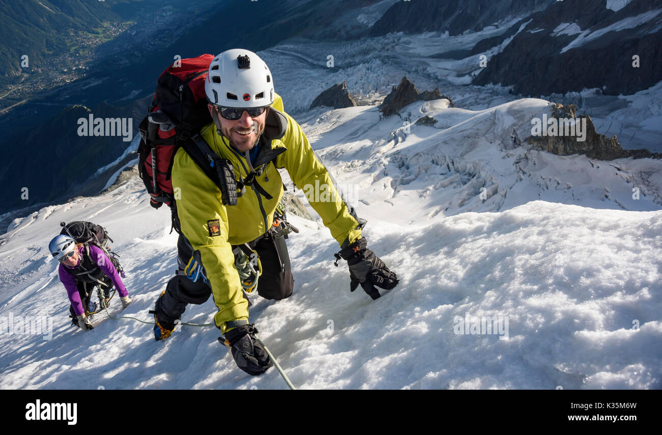 Two climbers on the North Ridge of the Dome du Gouter Stock Photo