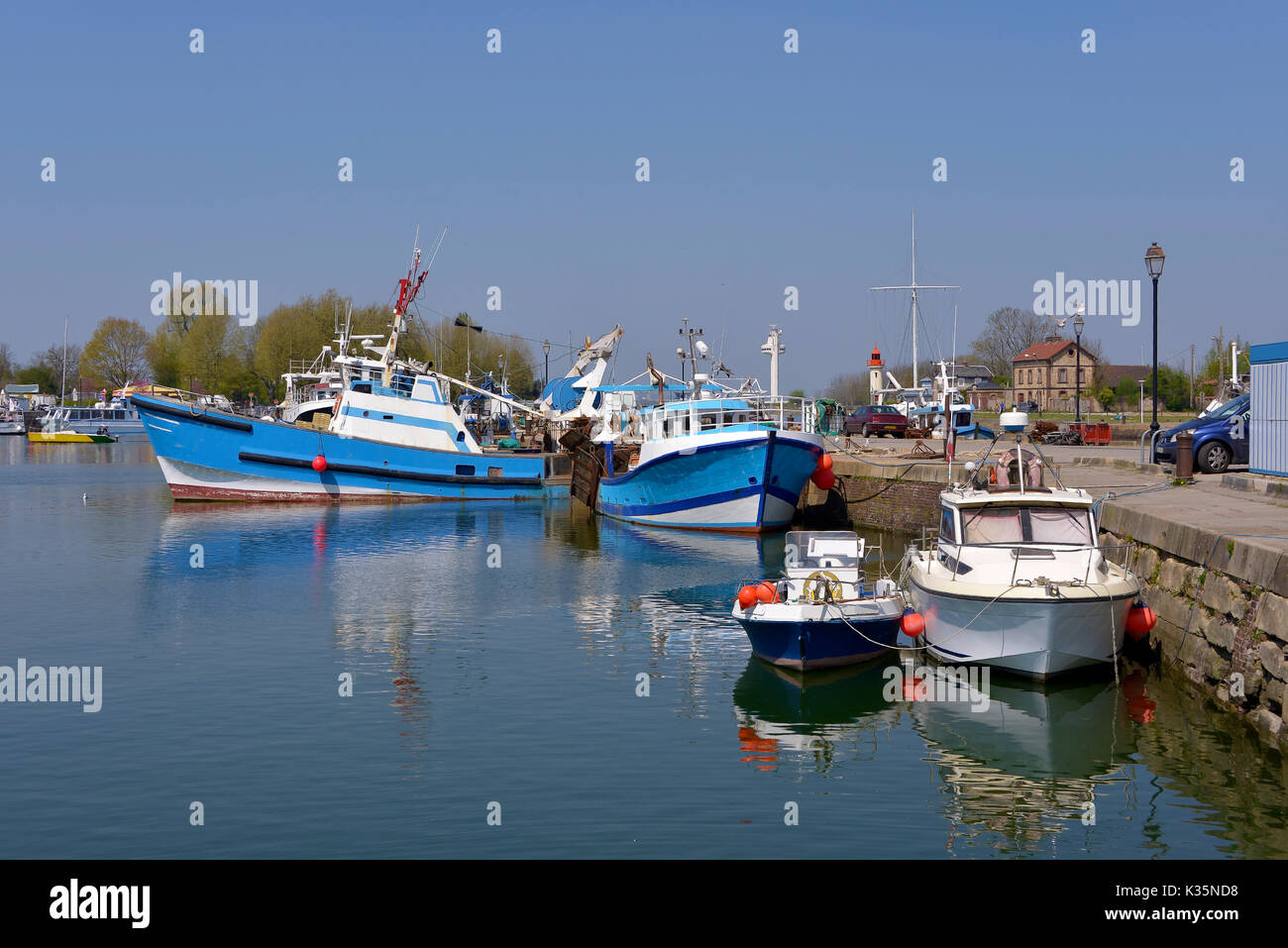 Fishing boats in the port of Honfleur, commune in the Calvados department in the lower Normandy region in northwestern France Stock Photo