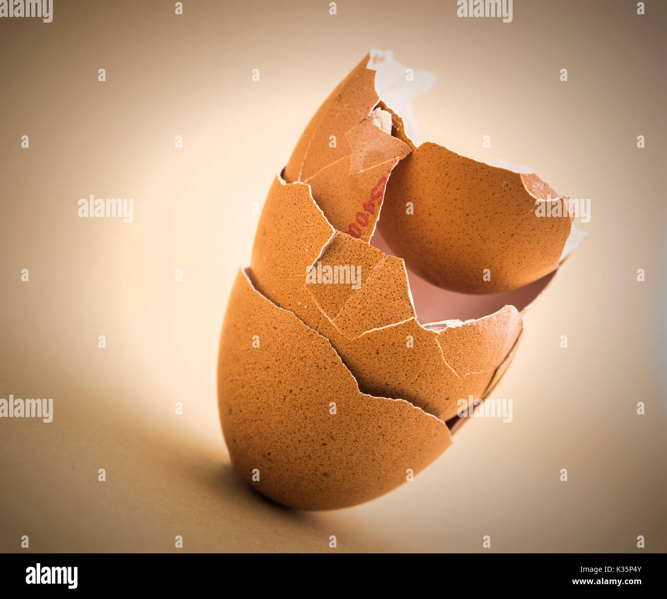 Scattered broken egg shells isolated in white background Stock Photo