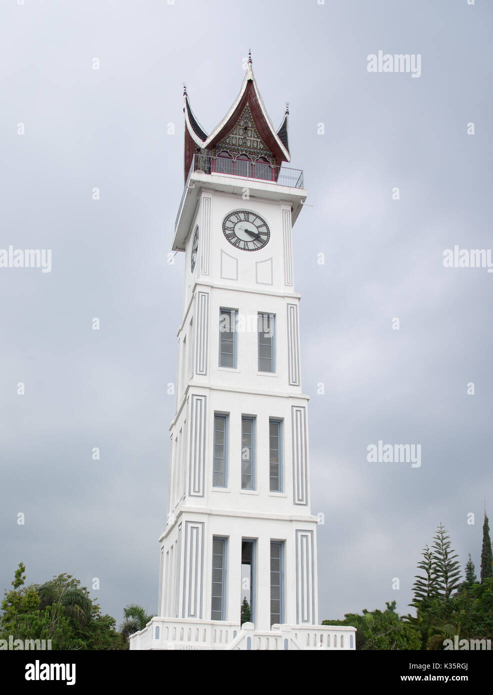 Jam Gadang, Bukittinggi white clock tower in central Bukittinggi, a city in the Minangkabau Highlands of West Sumatra. It sits in the middle of the Sa Stock Photo
