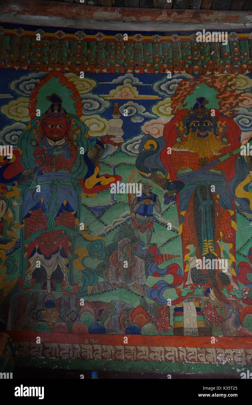 Buddhist wall paintings in Choede Gompa, Lo Manthang in Upper Mustang, Nepal Stock Photo