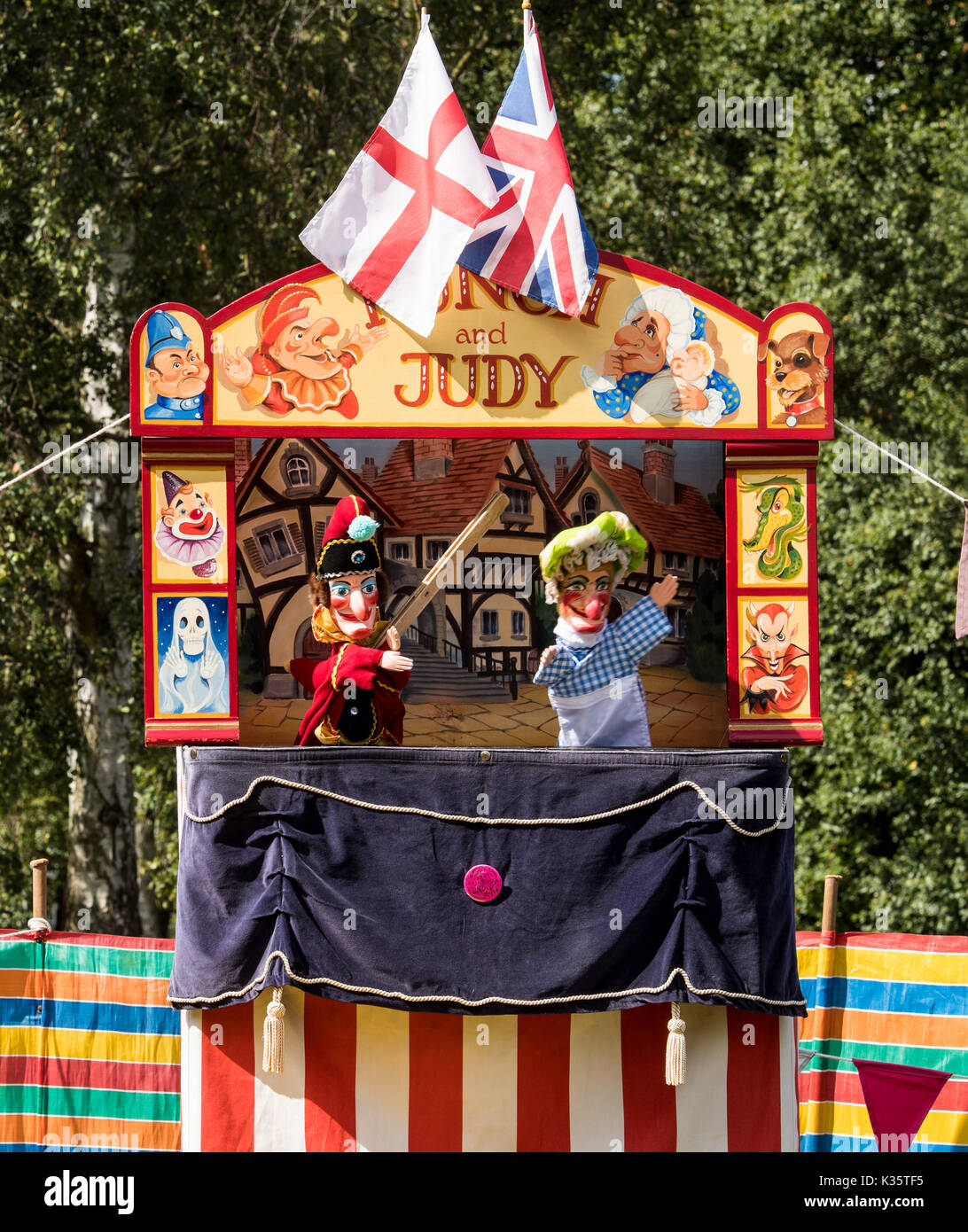 a traditional Punch and Judy show by David Wilde in an English park in the summer at Brentwood, Essex with the Mr Punch and Judy puppets Stock Photo