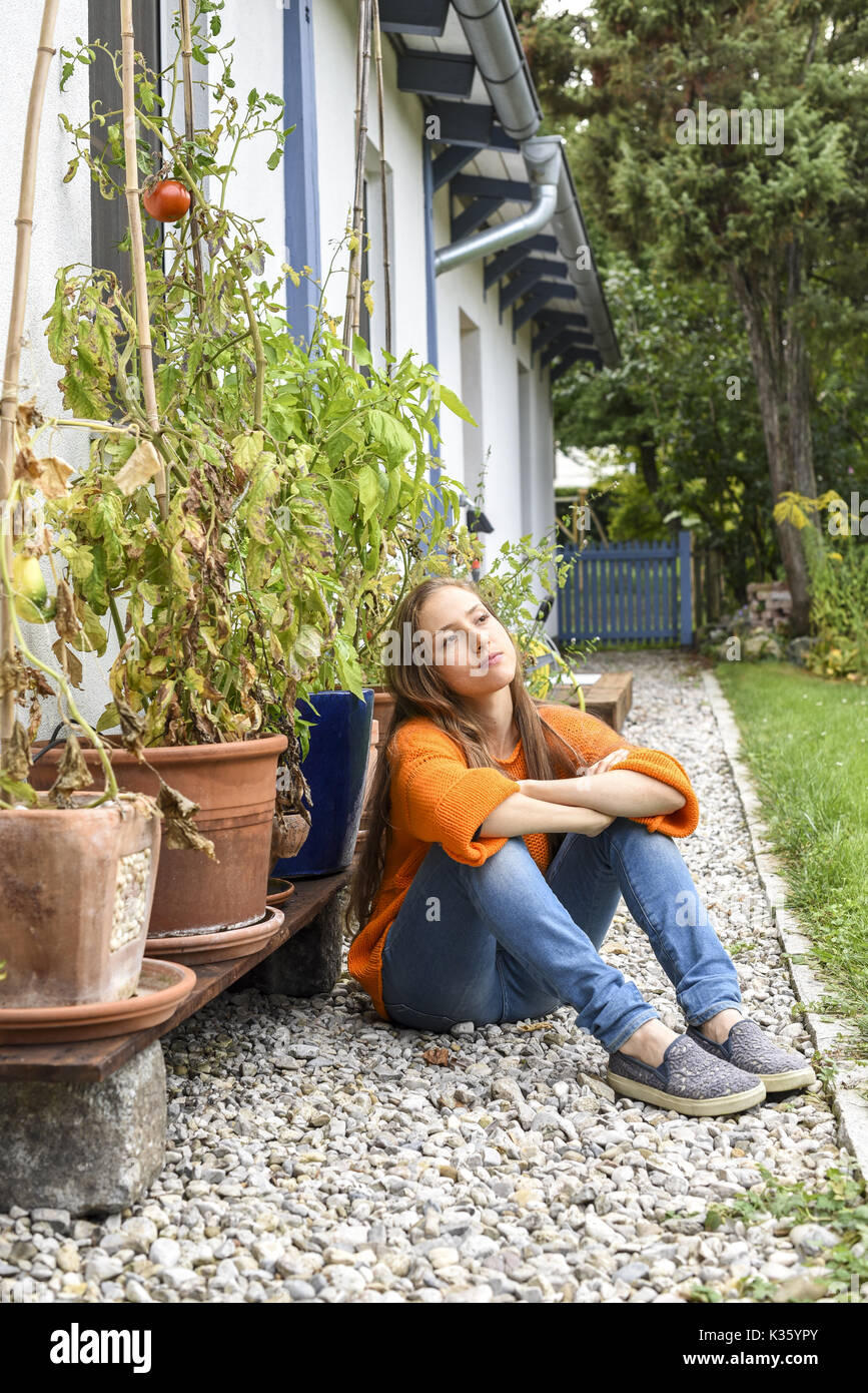 Yound woman in her garden, near Vienna, Austria (model-released) Stock Photo