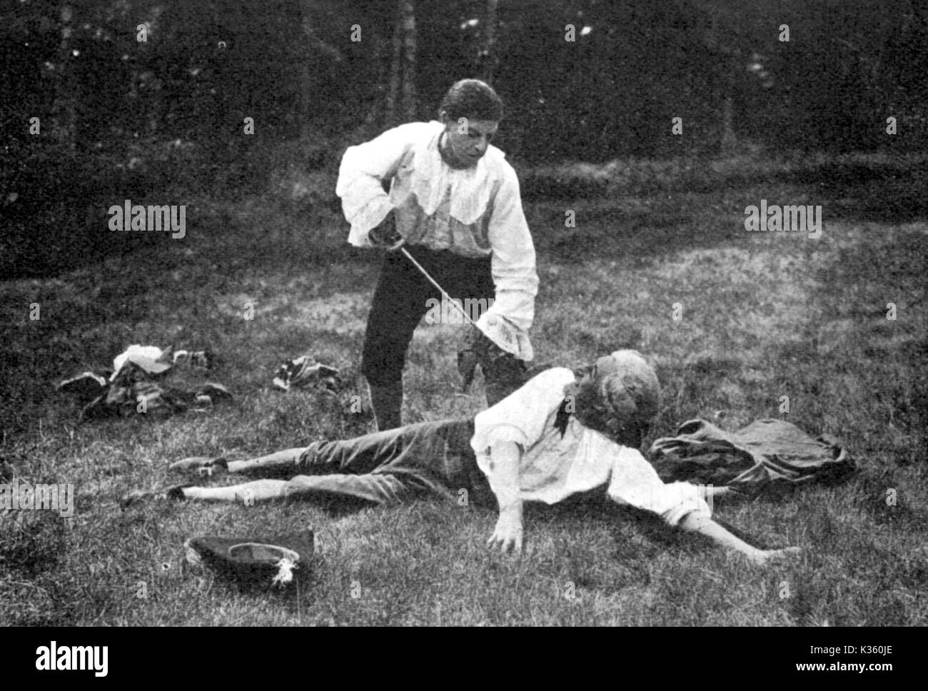 BARNABY RUDGE GEOFFREY HAREDALE (JOHN McANDREWS) KILLS SIR JOHN CHESTER (HENRY VIBART)   BARNABY RUDGE JOHN McANDREWS as Geoffrey Haredale kills HENRY VIBART as Sir John Chester     Date: 1915 Stock Photo