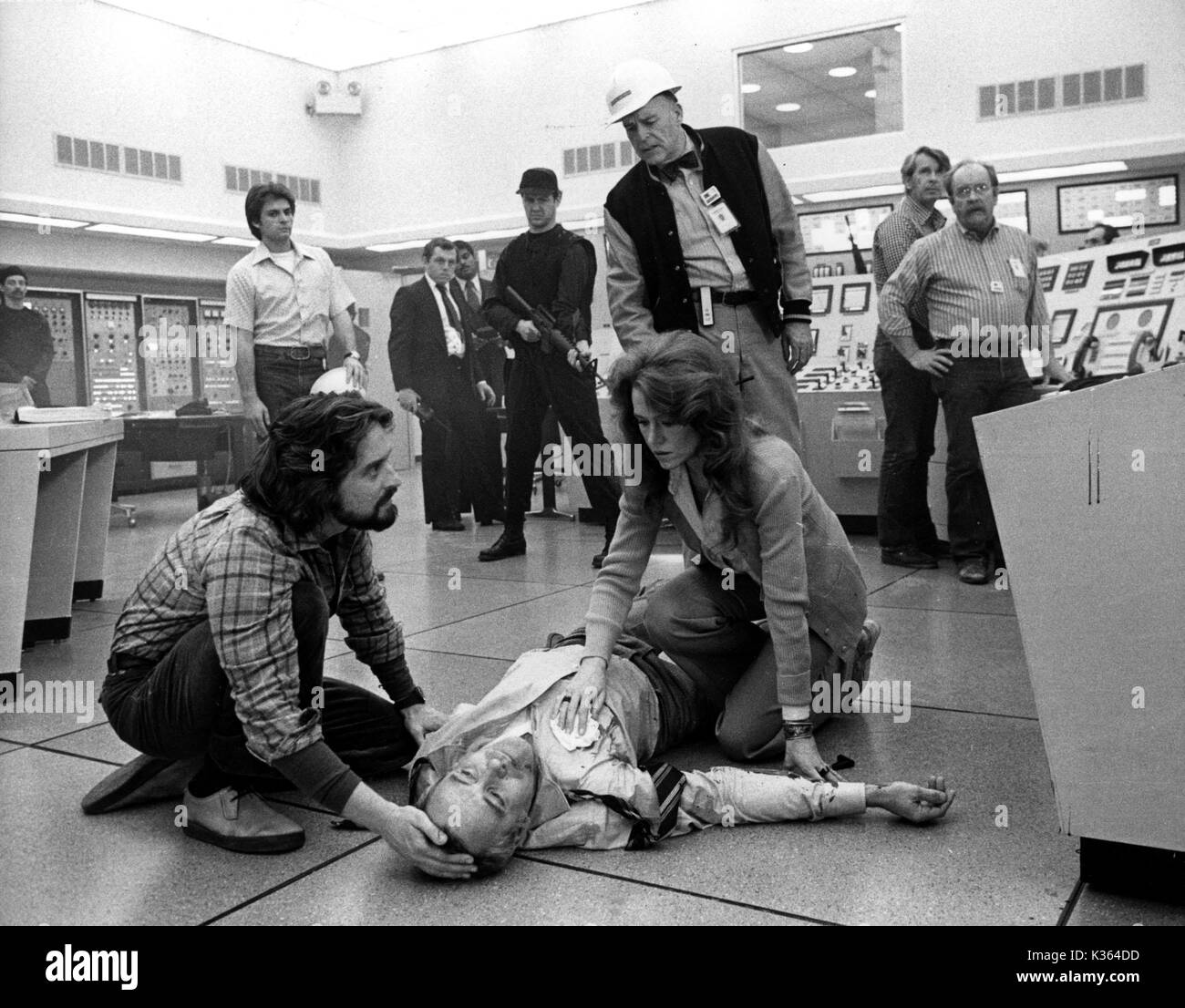 THE CHINA SYNDROME foreground, L-R, MICHAEL DOUGLAS, JACK LEMMON, JANE FONDA Stock Photo